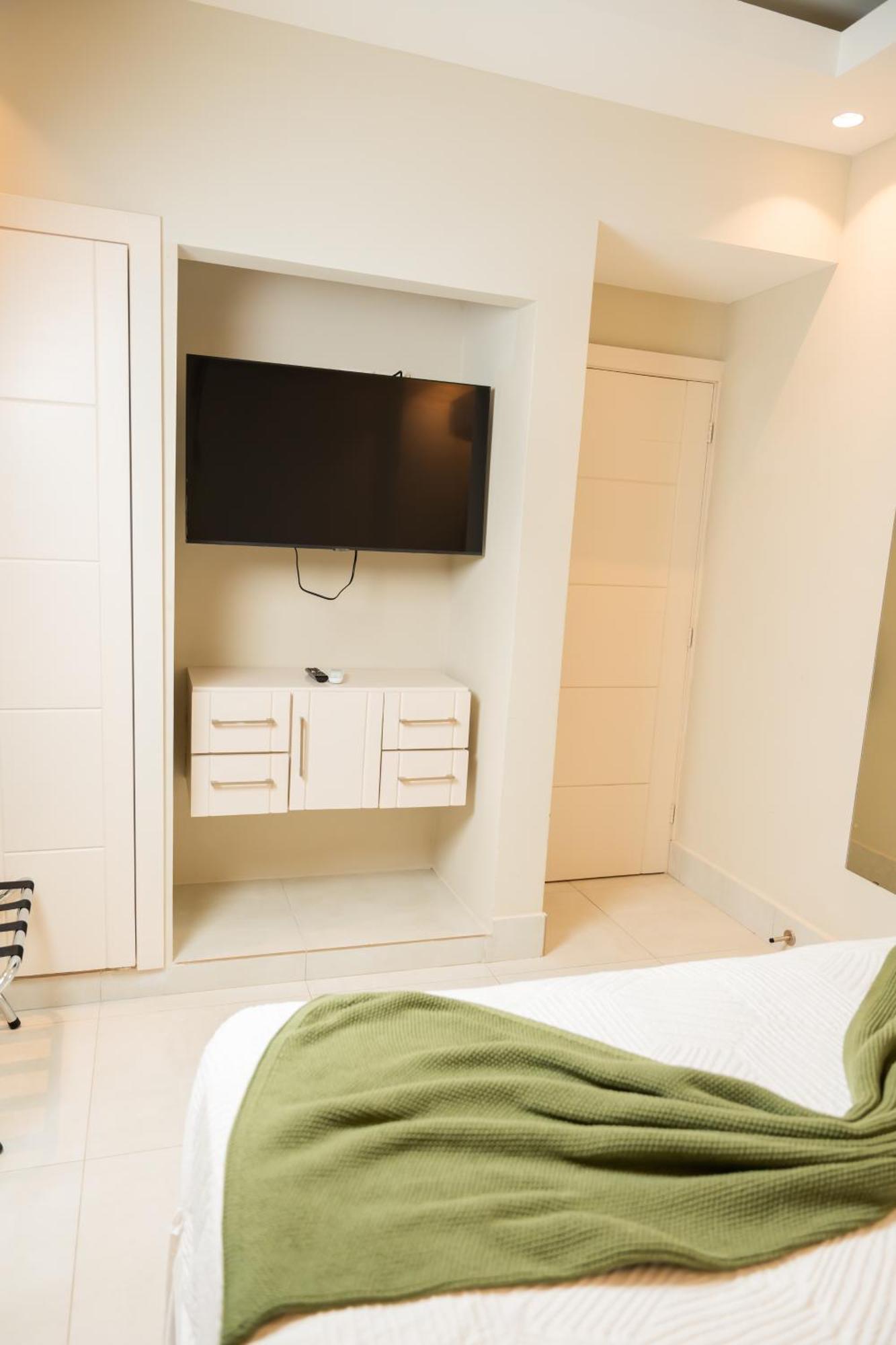 Hotel Stay Here Suites Санто Доминго Стая снимка