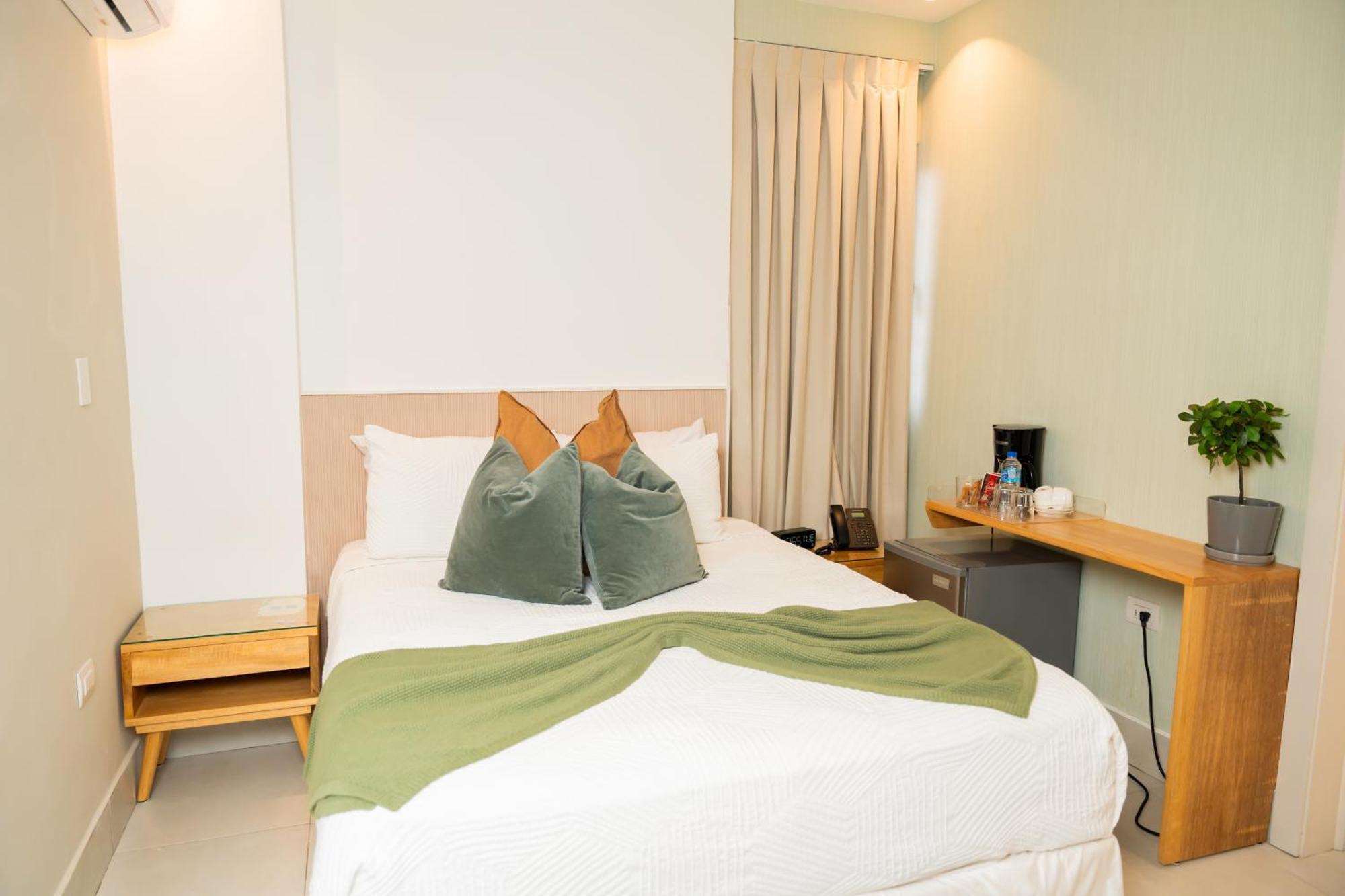 Hotel Stay Here Suites Санто Доминго Екстериор снимка